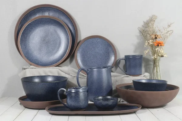 Color clay dinnerware in double reactive glaze