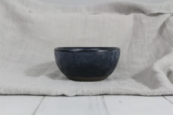 Color clay dinnerware in double reactive glaze