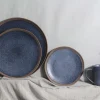 Color clay dinnerware in double reactive glaze