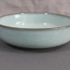 Round dinnerware in terracotta clay