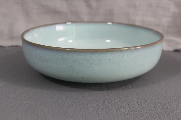 Round dinnerware in terracotta clay