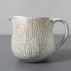 Milk jug with rays design
