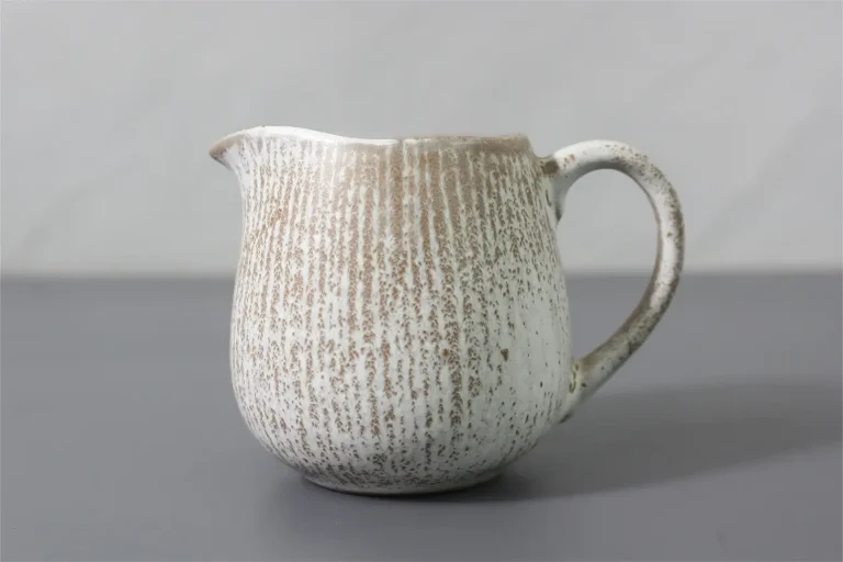 Milk jug with rays design