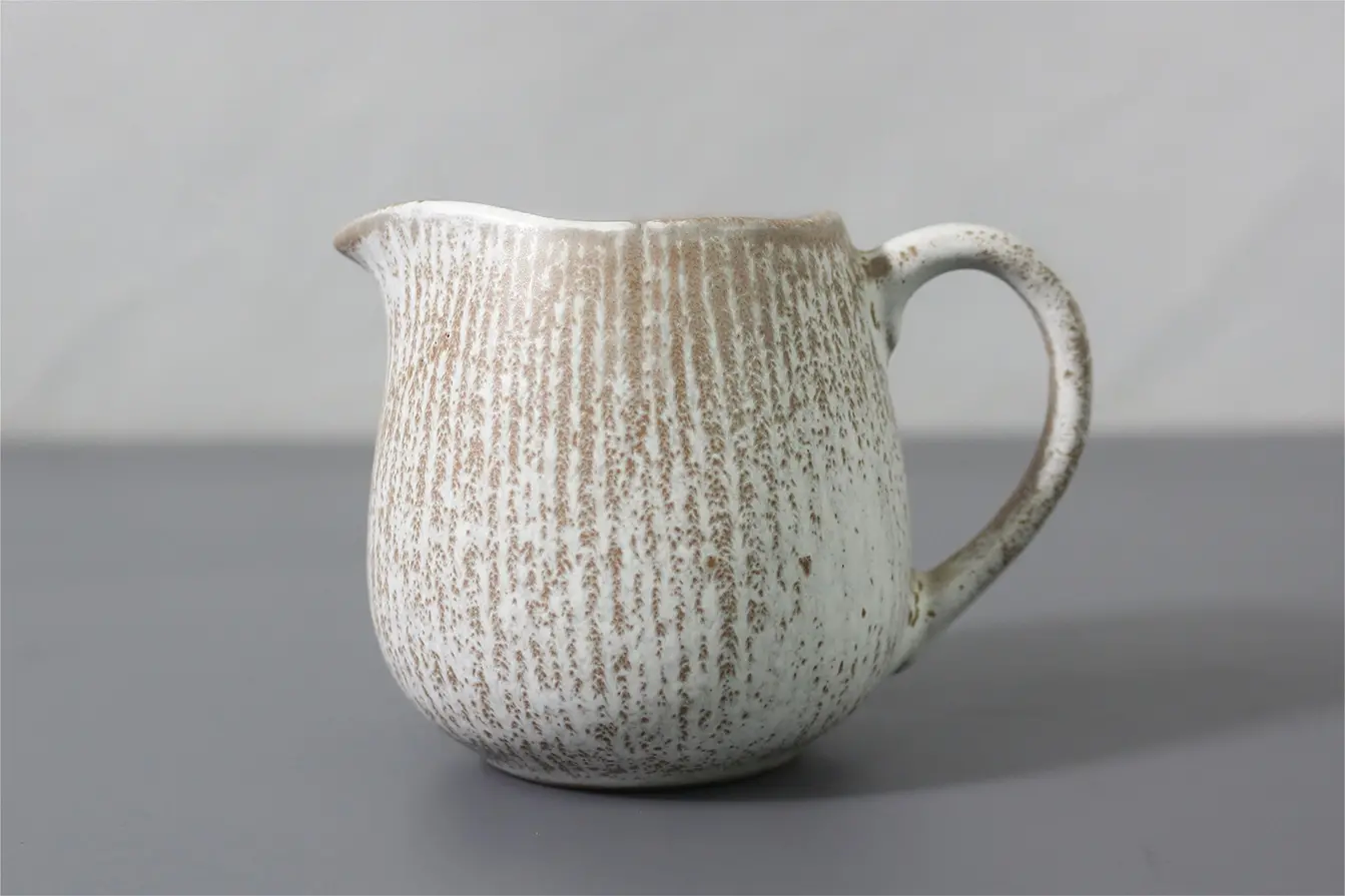 Milk jug with rays design