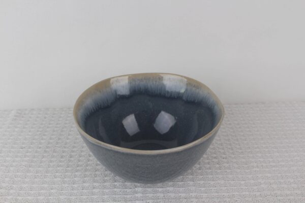 Blue Mist reactive glaze ceramic bowl with deep blue interior and natural gradient rim