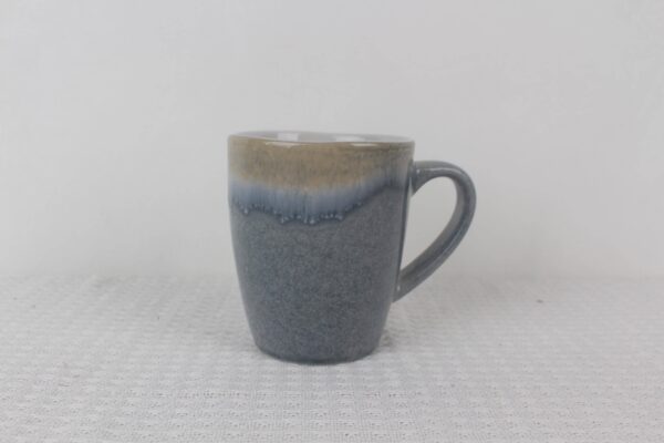 Blue Mist reactive glaze ceramic mug with soft blue gradient finish