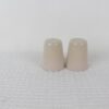 Pair of Sandstone beige stoneware salt and pepper shakers with tapered shapes and contrasting surface finishes